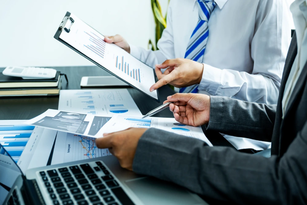 business experts discussing business data
