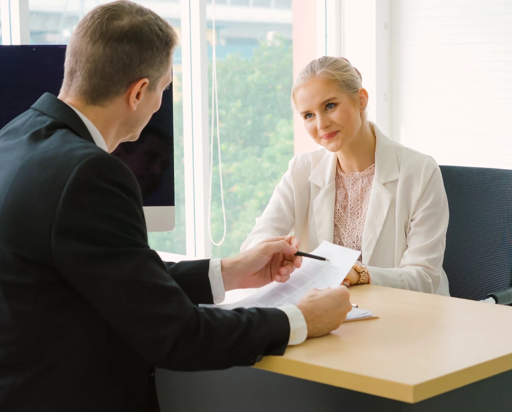 pharmacist and advisor talking about pharmacy partnership contract